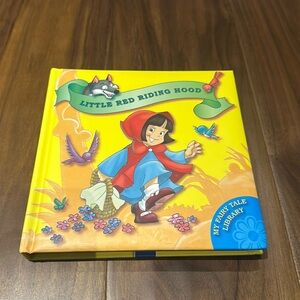 Brand new puffy hard cover book.  Little Red Riding Hood.